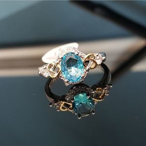 Blue Topaz,  White Topaz n Gold Hearts Ring